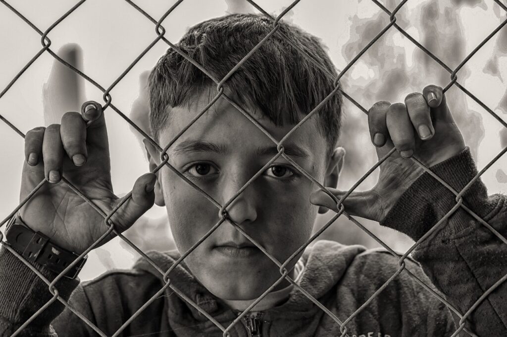 boy, fence, poverty-1226964.jpg